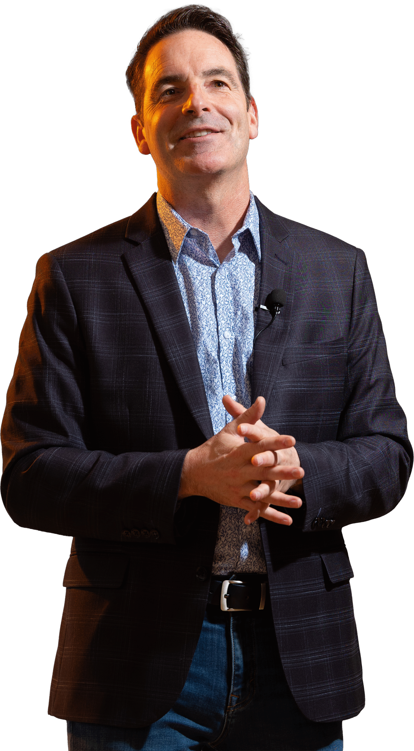 Tim with hands clasped